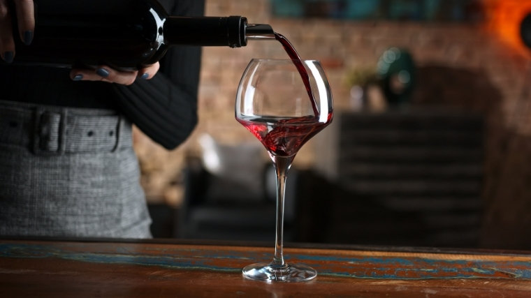 Woman pouring wine