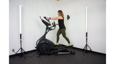 A woman using an elliptical