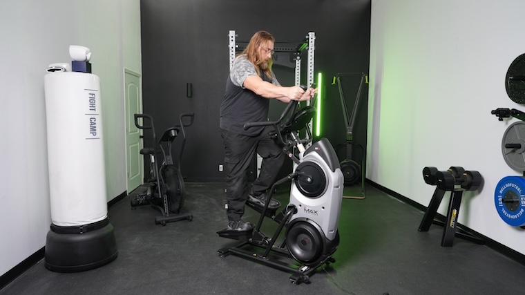 Our tester working out atop the Bowflex Max Trainer M6