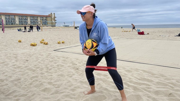 Our BarBend Tester warms up for volleyball with one of the Iron Bull Mini Bands.