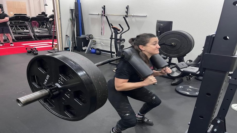 Our tester squatting with the Bells of Steel SS4 safety squat bar,