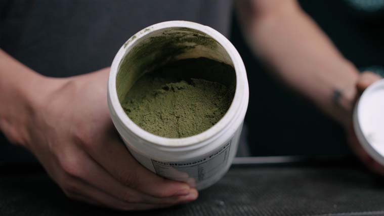 A BarBend tester showing greens powder.