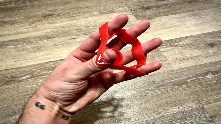 Our tester using the Title Boxing Grip Strengthener